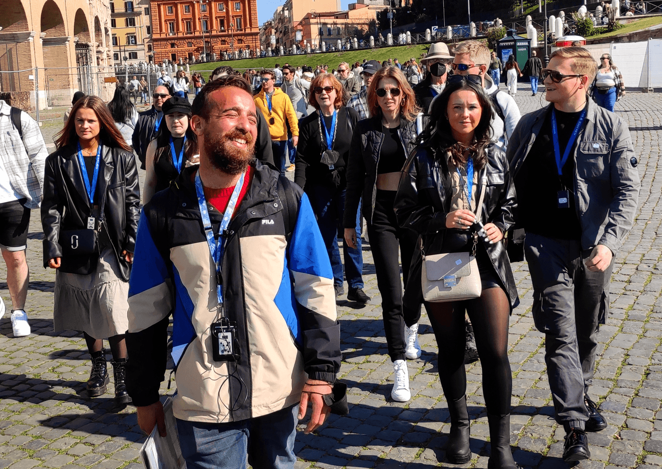 Augustine leading a tour group